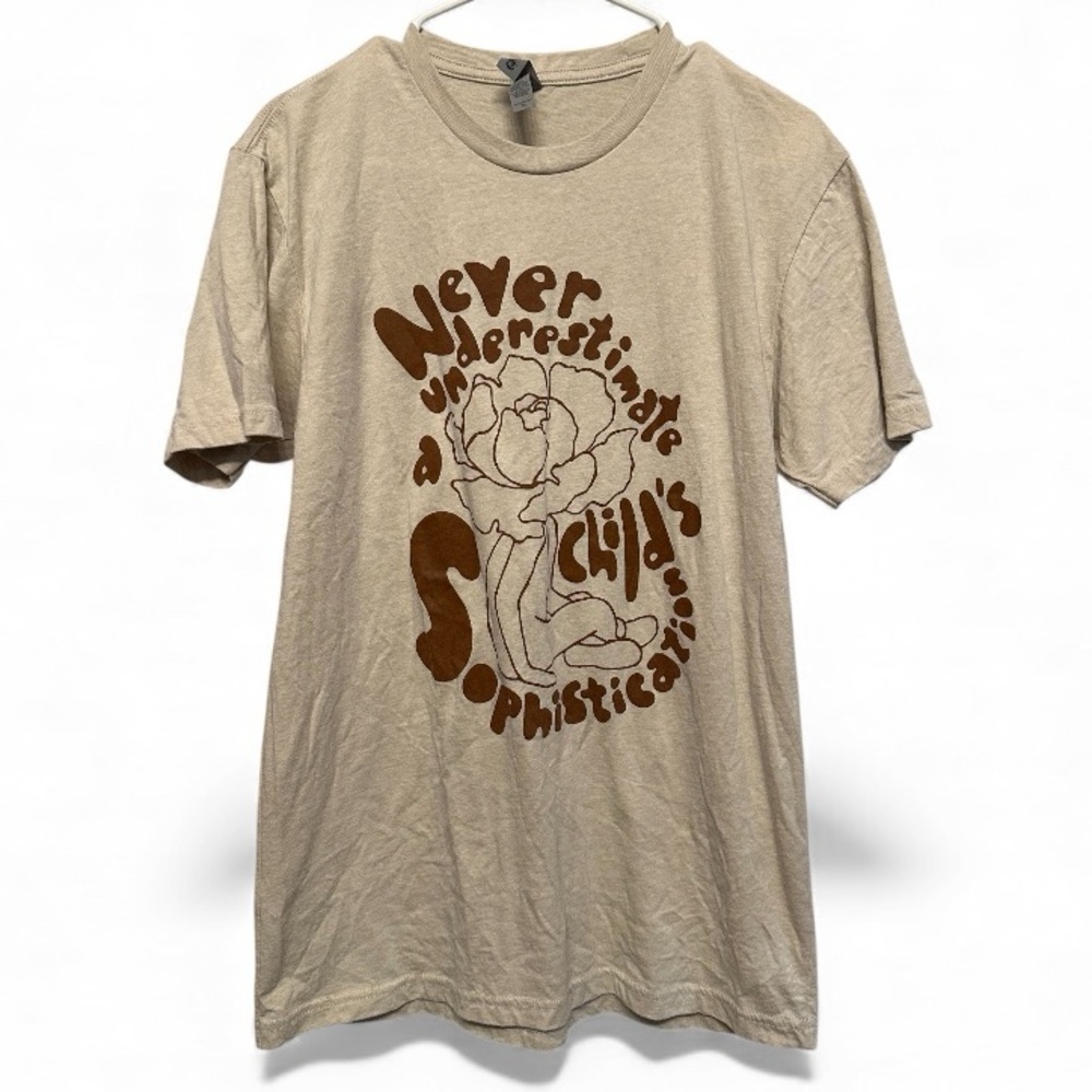 “Never Underestimate a Child’s Sophistication”Beige Graphic Tee Medium